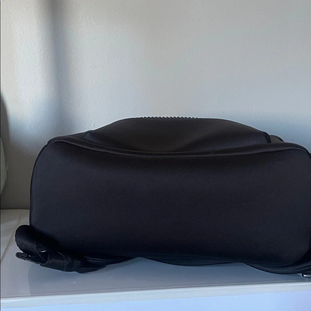 Good condition Dagne Dover Medium Dakota Neoprene Backpack for women